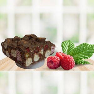 An image of Rocky Road with Raspberry, Macadamia, and Milk Chocolate in countertop. 